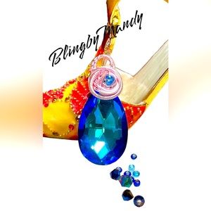 Stunning pink plated copper wire wrapped titanium bead pendant